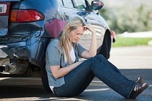 A woman suffers from an automobile accident injury in Vancouver.