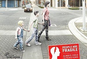 An image of a mother and her children crossing street
