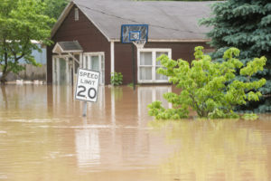 flooded street and house