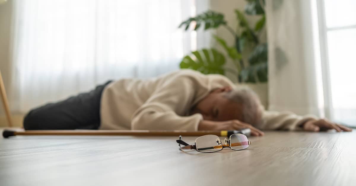 Older person and glasses on floor after trip and fall. | Klein Lawyers